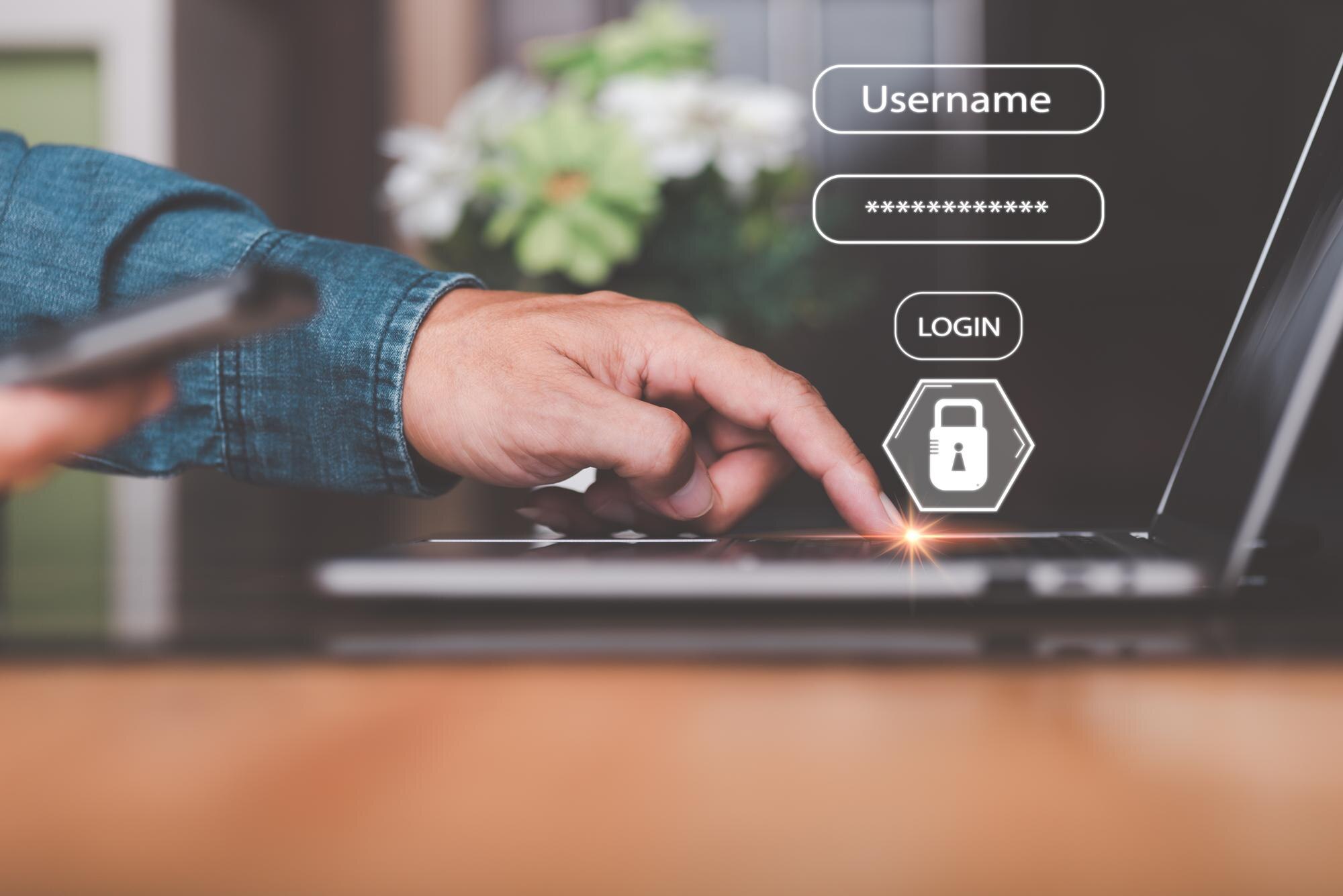 Biznesmen logujący się za pośrednictwem laptopa cyfrowe zabezpieczenia odblokowanie lub szyfrowanie koncepcje bezpieczne lo